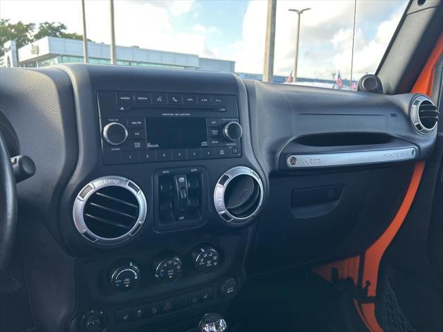 used 2012 Jeep Wrangler Unlimited car, priced at $16,579