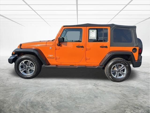 used 2012 Jeep Wrangler Unlimited car, priced at $16,579