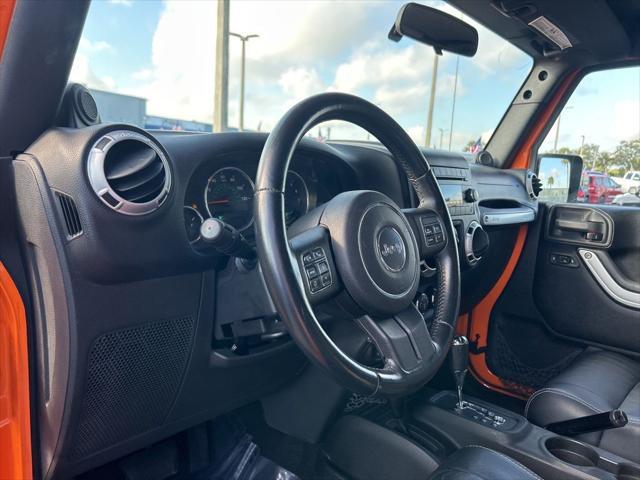 used 2012 Jeep Wrangler Unlimited car, priced at $16,579