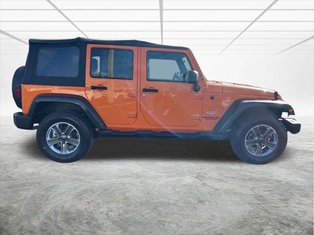 used 2012 Jeep Wrangler Unlimited car, priced at $16,579