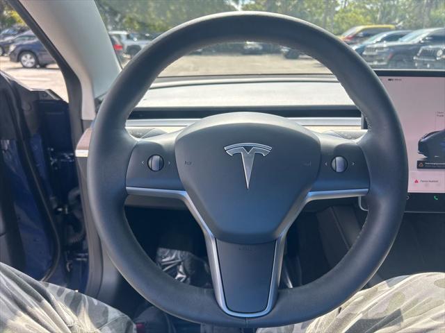 used 2023 Tesla Model 3 car, priced at $25,877