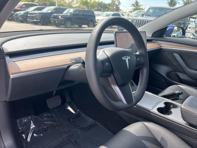 used 2023 Tesla Model 3 car, priced at $25,877