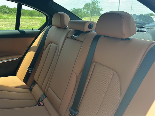 new 2025 BMW 330 car, priced at $50,980
