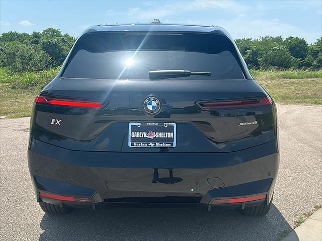 new 2026 BMW iX car, priced at $82,325