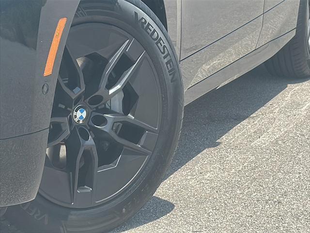 new 2026 BMW iX car, priced at $82,325