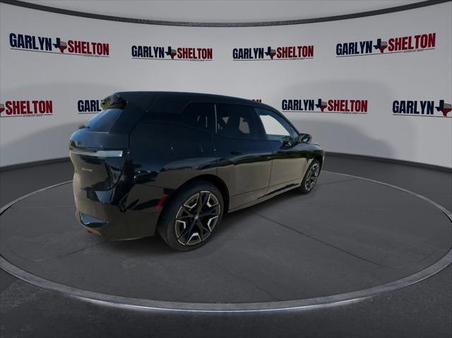 new 2024 BMW iX car, priced at $97,495