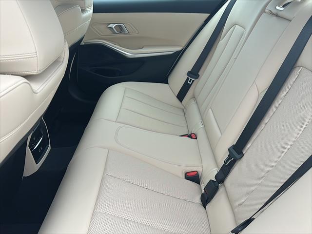 new 2025 BMW 330 car, priced at $50,555