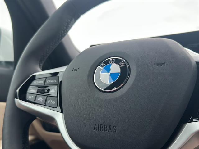 new 2025 BMW 330 car, priced at $50,555