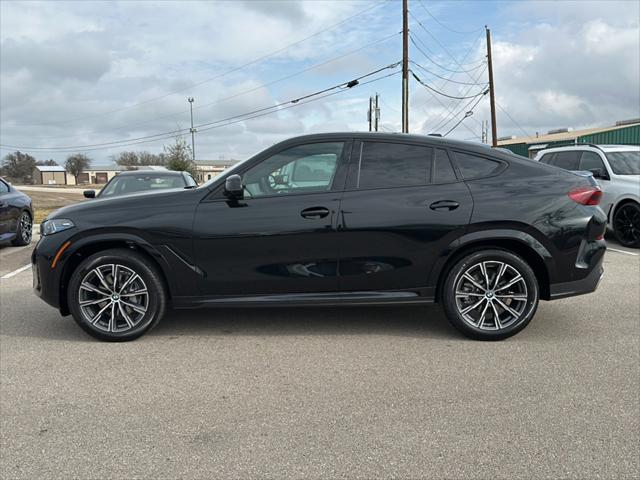 new 2025 BMW X6 car, priced at $77,875