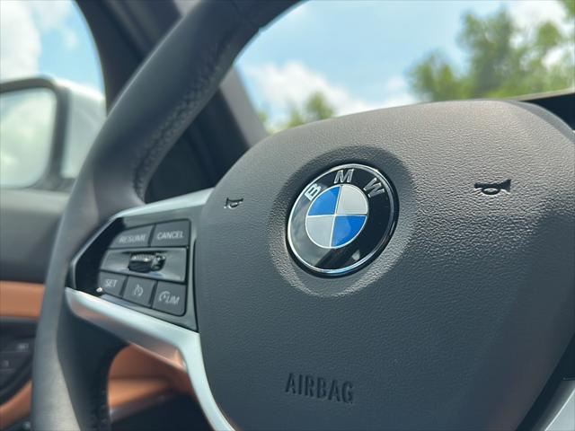 new 2025 BMW 330 car, priced at $50,425