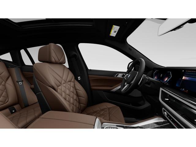 new 2025 BMW X6 car, priced at $85,825