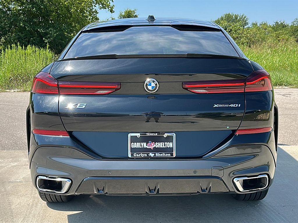used 2024 BMW X6 car, priced at $58,495