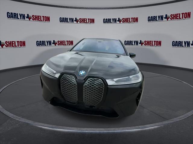 new 2024 BMW iX car, priced at $97,495