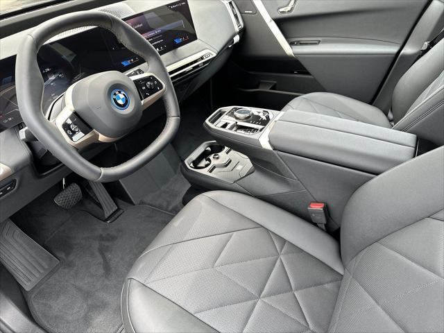 new 2024 BMW iX car, priced at $97,495