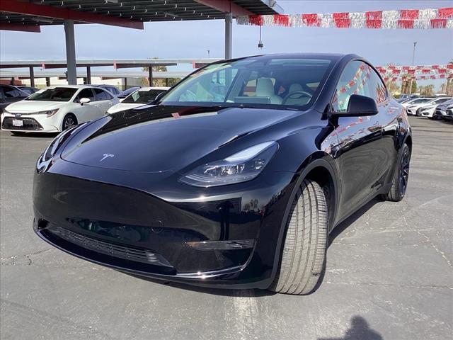 used 2024 Tesla Model Y car, priced at $38,998