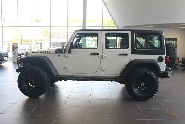 used 2016 Jeep Wrangler Unlimited car, priced at $15,990