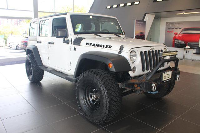 used 2016 Jeep Wrangler Unlimited car, priced at $16,690