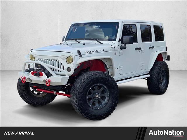 used 2014 Jeep Wrangler Unlimited car, priced at $16,995