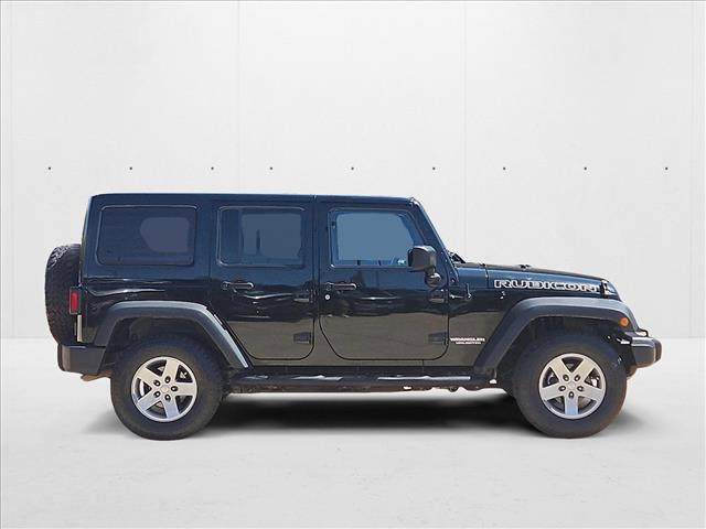 used 2012 Jeep Wrangler Unlimited car, priced at $16,989