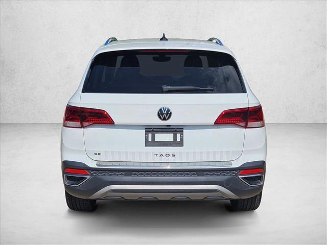 used 2023 Volkswagen Taos car, priced at $18,394