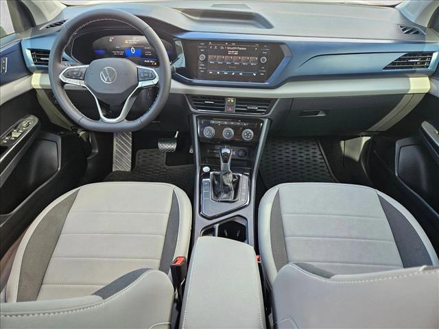 used 2023 Volkswagen Taos car, priced at $18,394