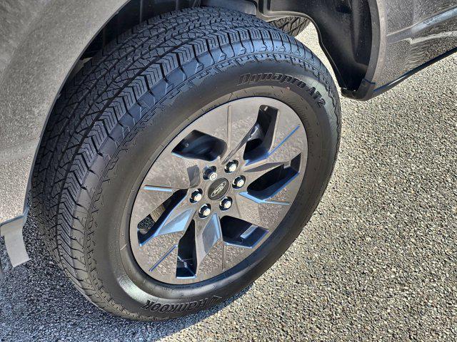 used 2023 Ford F-150 Lightning car, priced at $49,500