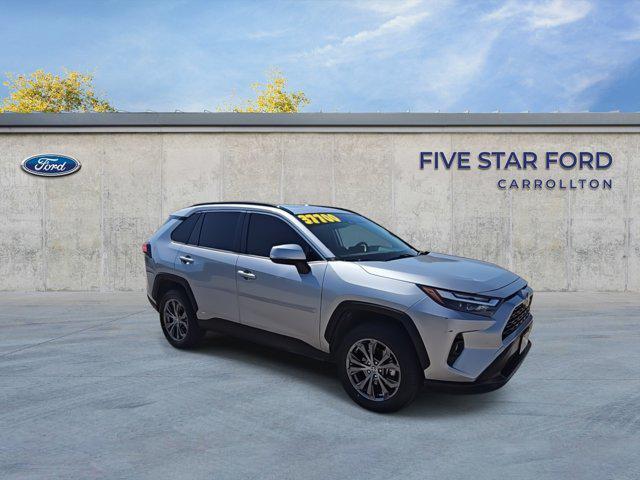 used 2023 Toyota RAV4 Hybrid car, priced at $32,000