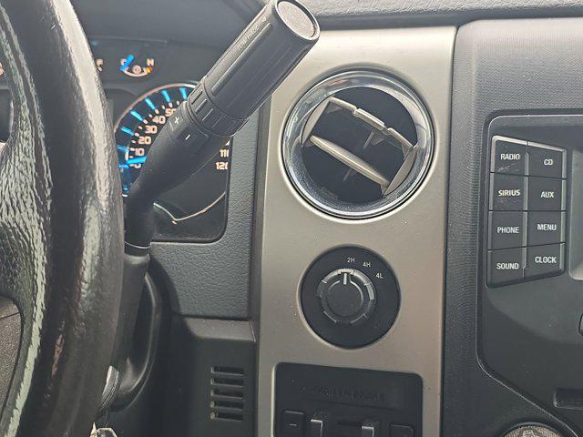 used 2014 Ford F-150 car, priced at $15,000