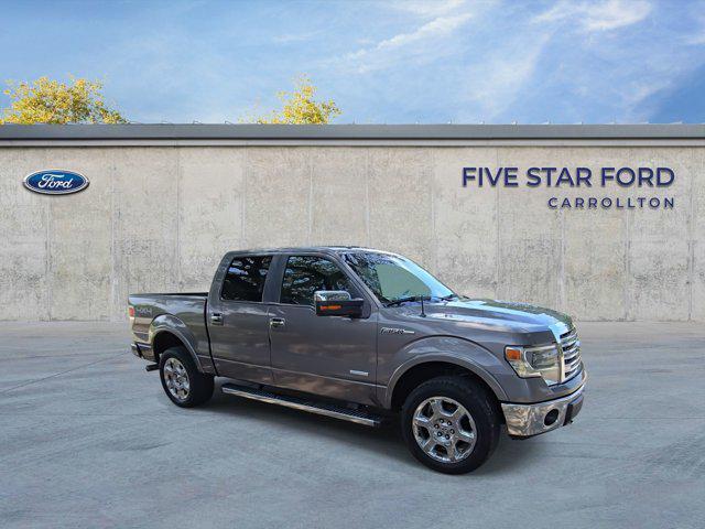 used 2014 Ford F-150 car, priced at $15,000