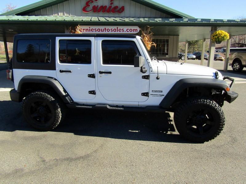 used 2018 Jeep Wrangler JK Unlimited car, priced at $23,995