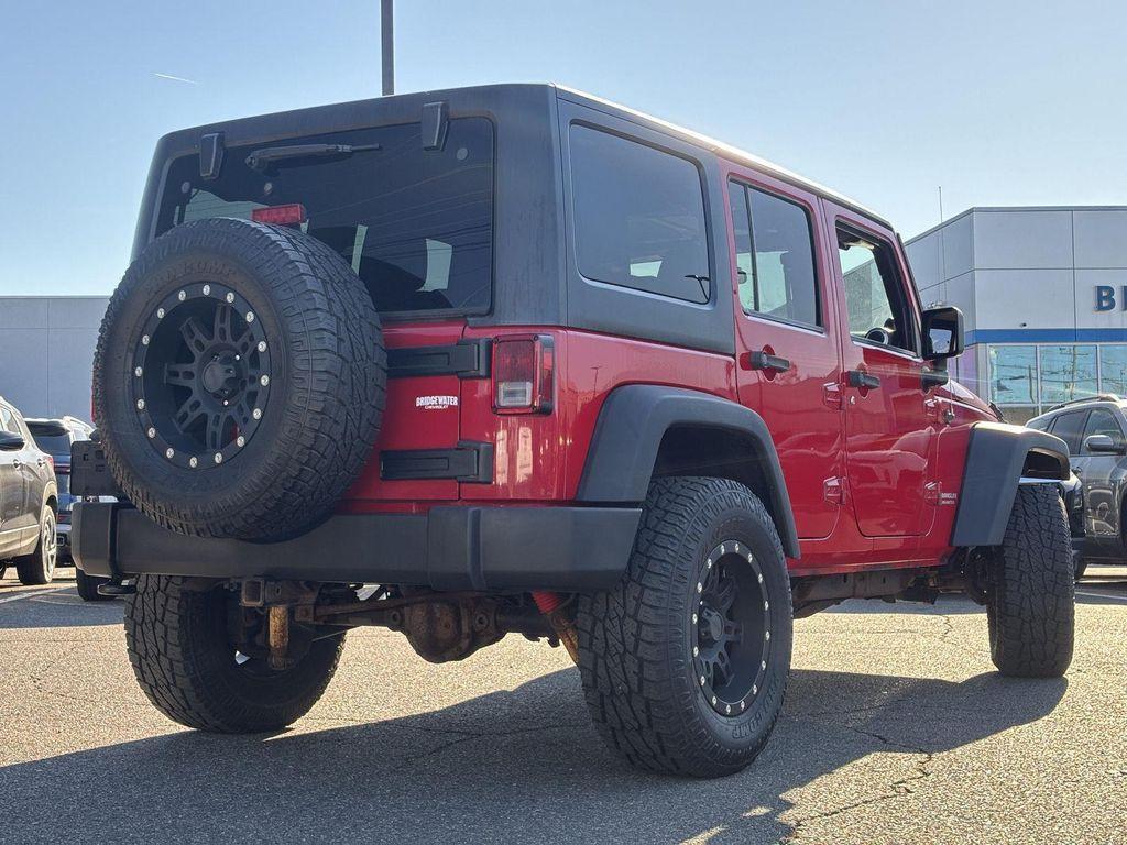 used 2011 Jeep Wrangler Unlimited car, priced at $11,499