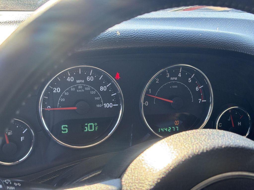 used 2011 Jeep Wrangler Unlimited car, priced at $11,499