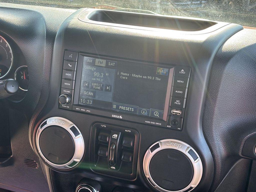 used 2011 Jeep Wrangler Unlimited car, priced at $11,499