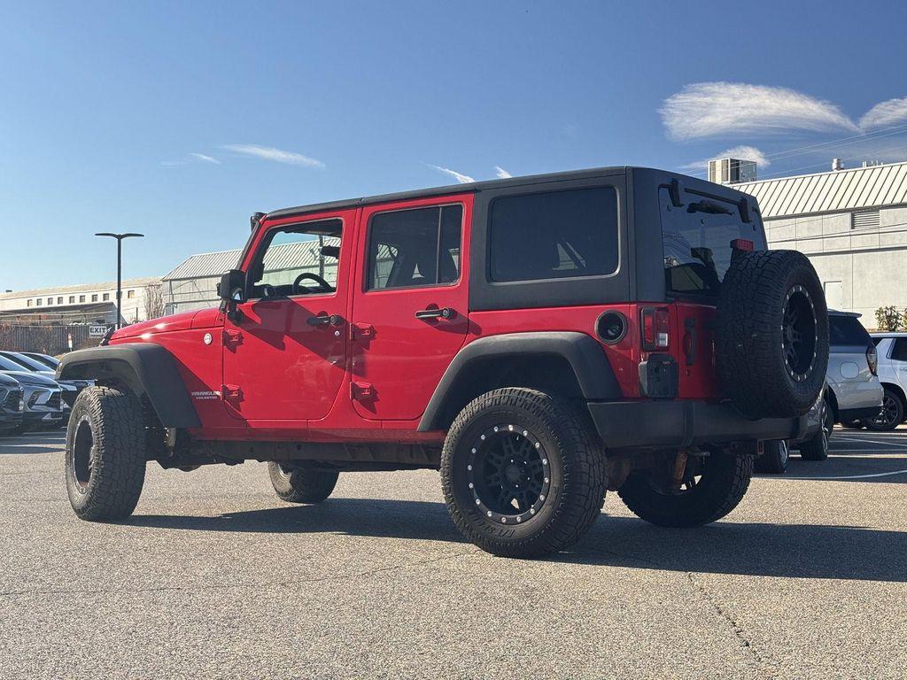 used 2011 Jeep Wrangler Unlimited car, priced at $11,499