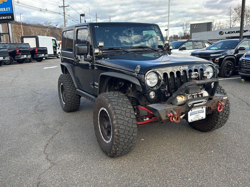 used 2016 Jeep Wrangler car, priced at $12,890