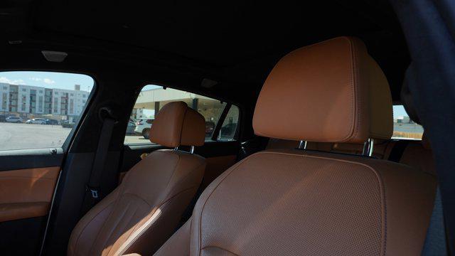 used 2021 BMW X6 car, priced at $56,492