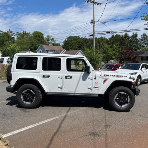 used 2021 Jeep Wrangler Unlimited car, priced at $30,558