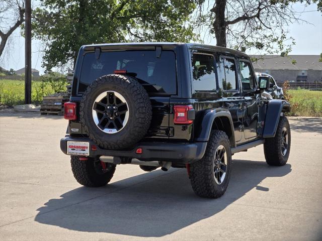 used 2021 Jeep Wrangler Unlimited car, priced at $42,857