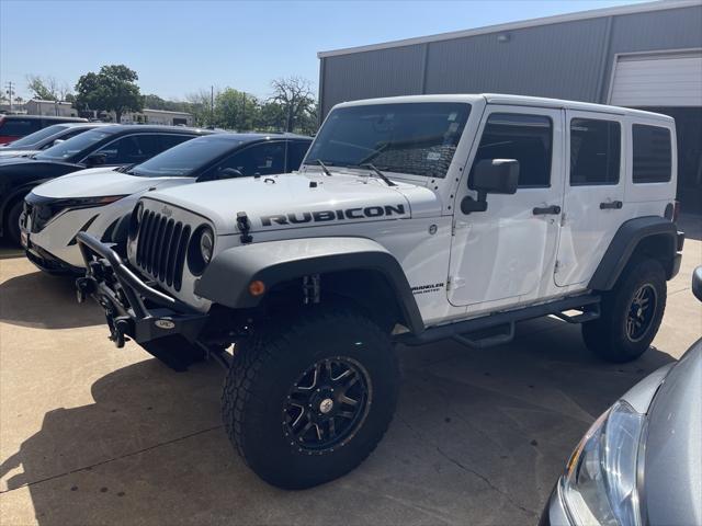used 2014 Jeep Wrangler Unlimited car, priced at $20,999