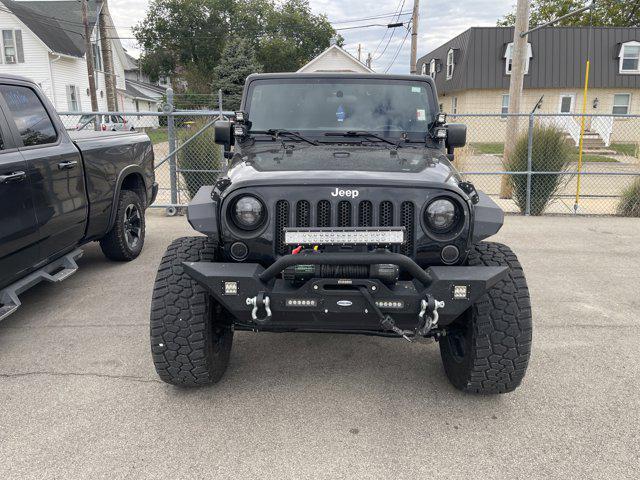 used 2016 Jeep Wrangler Unlimited car, priced at $21,393