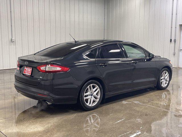 used 2015 Ford Fusion car, priced at $10,896