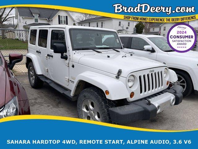 used 2013 Jeep Wrangler Unlimited car, priced at $19,954