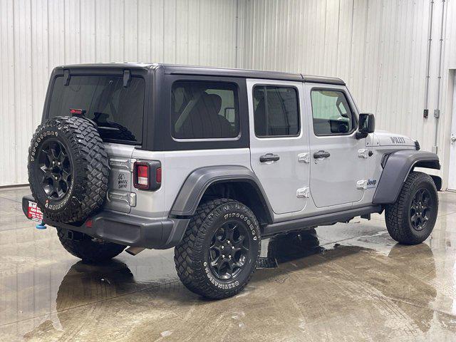 used 2023 Jeep Wrangler 4xe car, priced at $29,828