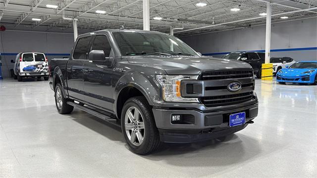 used 2018 Ford F-150 car, priced at $23,799