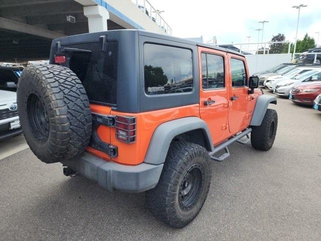 used 2015 Jeep Wrangler Unlimited car, priced at $23,840