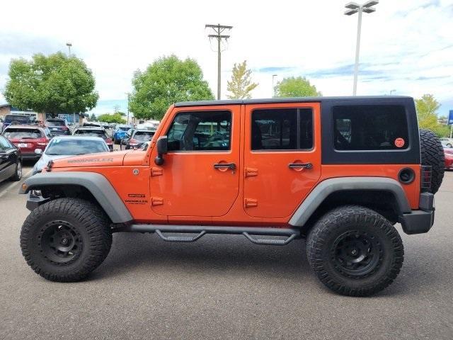 used 2015 Jeep Wrangler Unlimited car, priced at $23,840