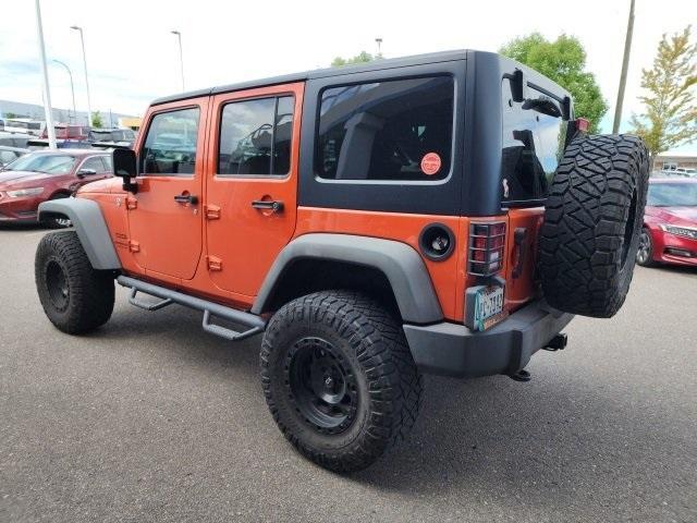 used 2015 Jeep Wrangler Unlimited car, priced at $23,840