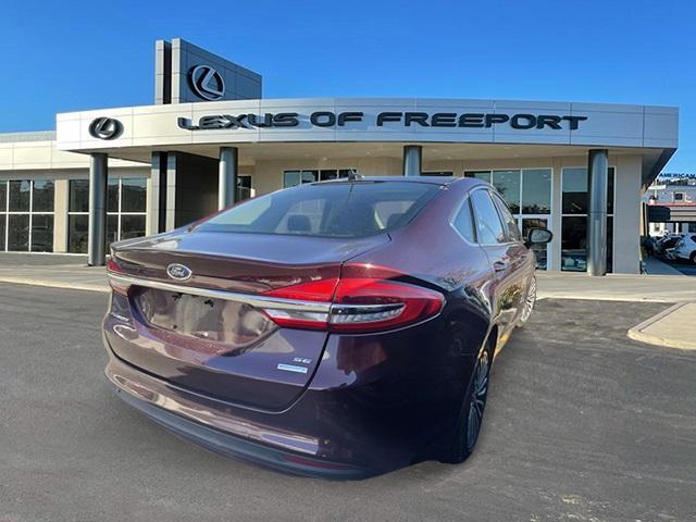 used 2018 Ford Fusion car, priced at $15,500