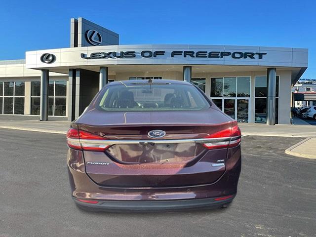 used 2018 Ford Fusion car, priced at $15,500