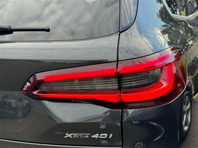 used 2023 BMW X5 car, priced at $50,000
